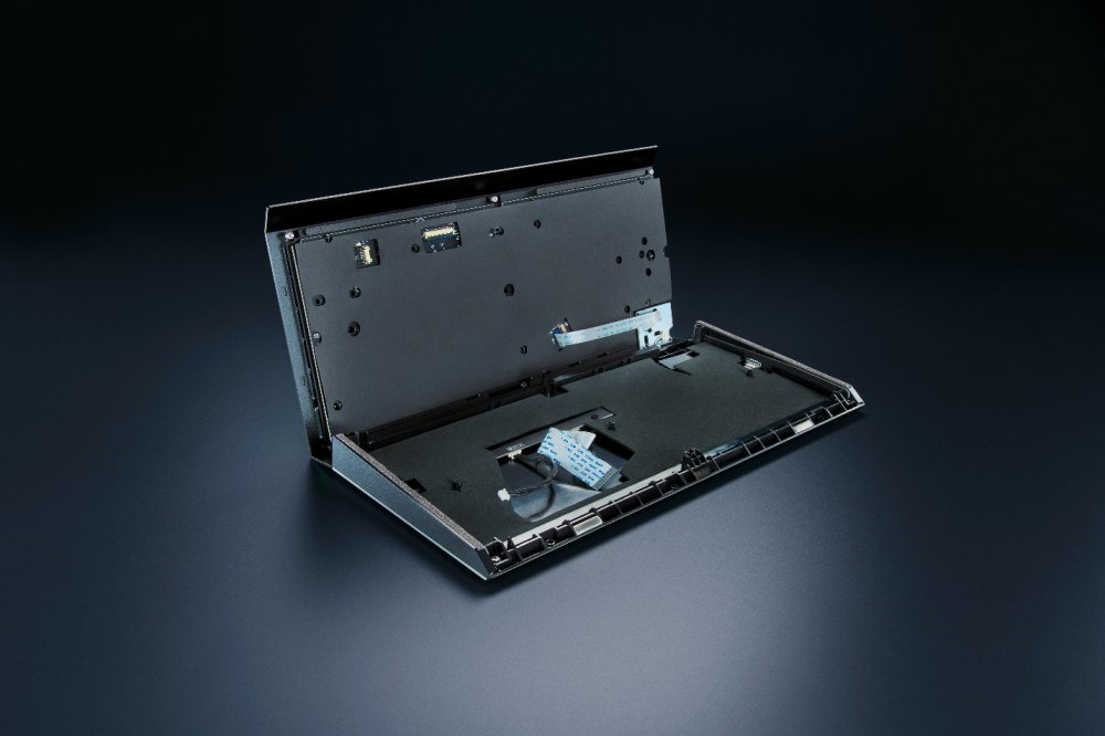 A black rectangular object with a black cover

Description automatically generated